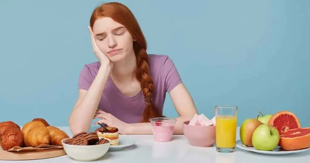 Best Foods to Combat Depression: Essential Nutrients & Diet Plans for Mental Well-being 2 Woman surrounded by healthy foods, thoughtfully considering her health and diet.